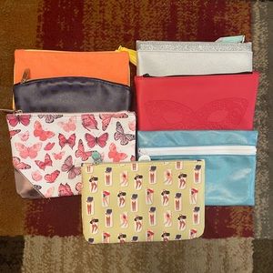 Makeup Bags from Ipsy, 7 bags included.